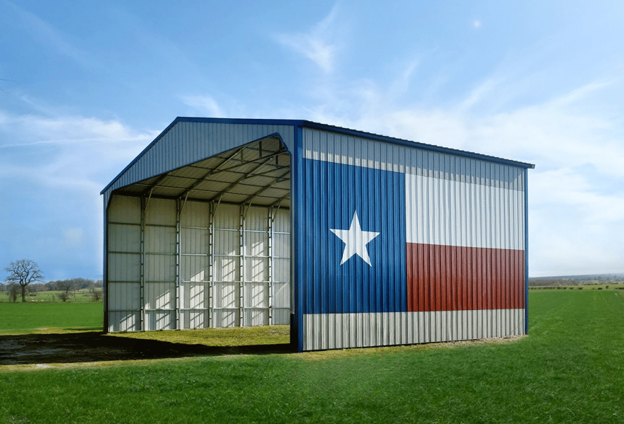 Open metal barn with Texas Flag painted on side.