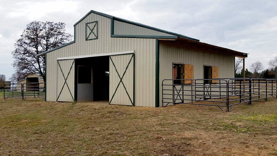 Raised Center Aisle Pole Barn with 3' Overhang