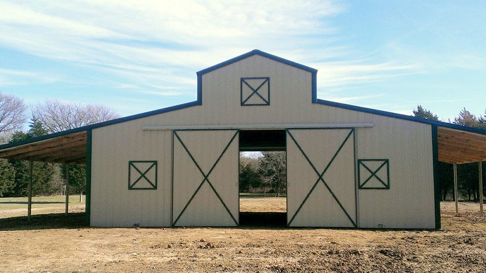 Raised Center Aisle Pole Barn with 2, Lean To's